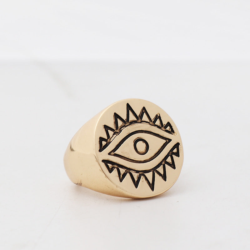Eye coin triangle gemstone ring