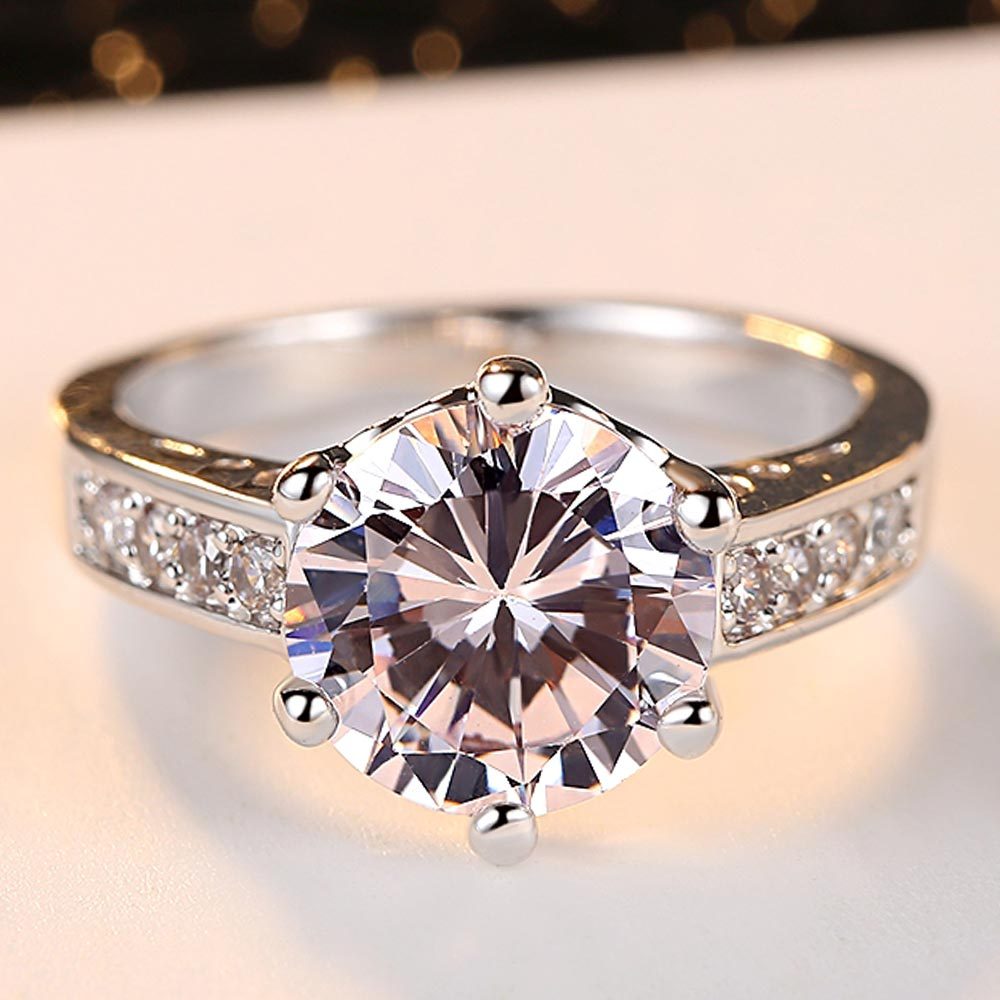 Six-claw gemstone gold ring