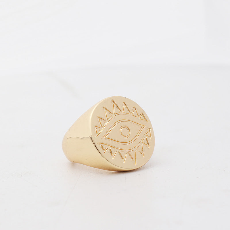 Eye coin triangle gemstone ring